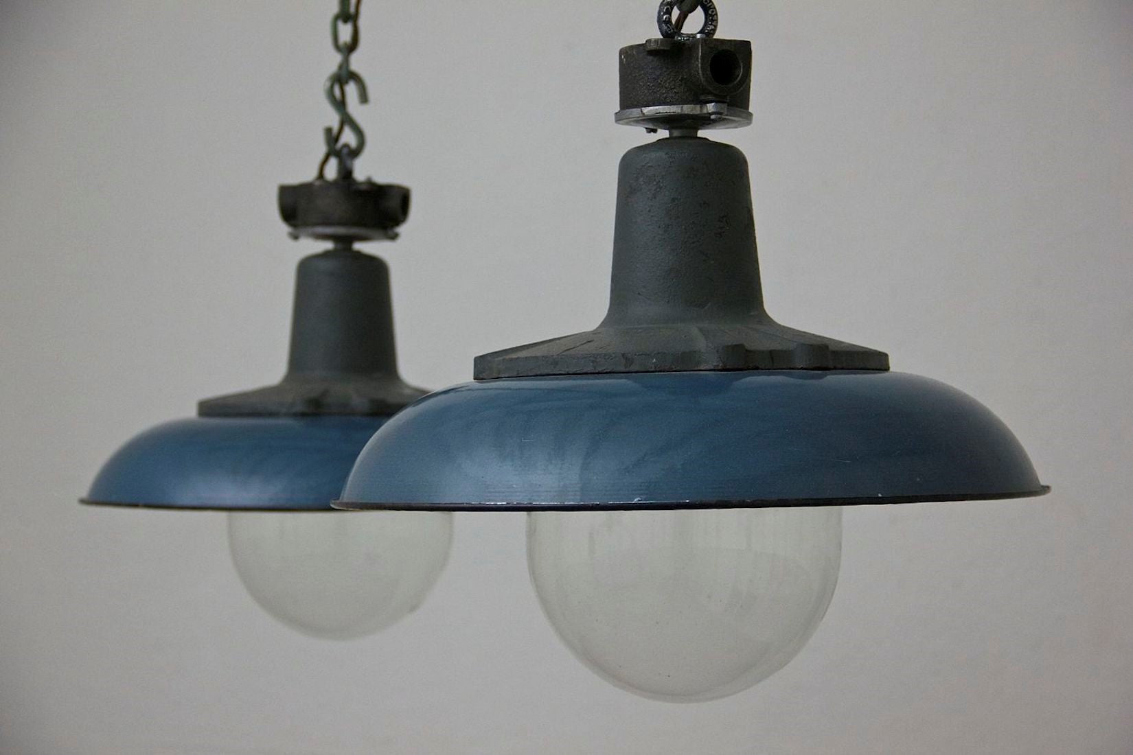 A blue enamelled pendant light (one remaining)