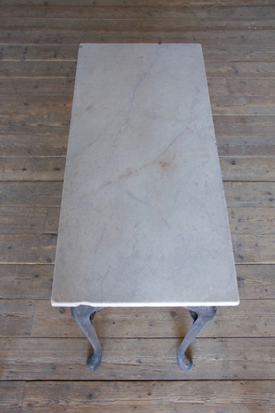 An iron and marble console table