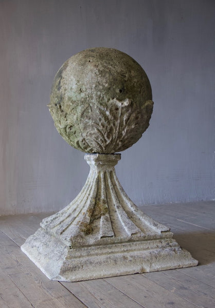 A Georgian carved stone pier ball