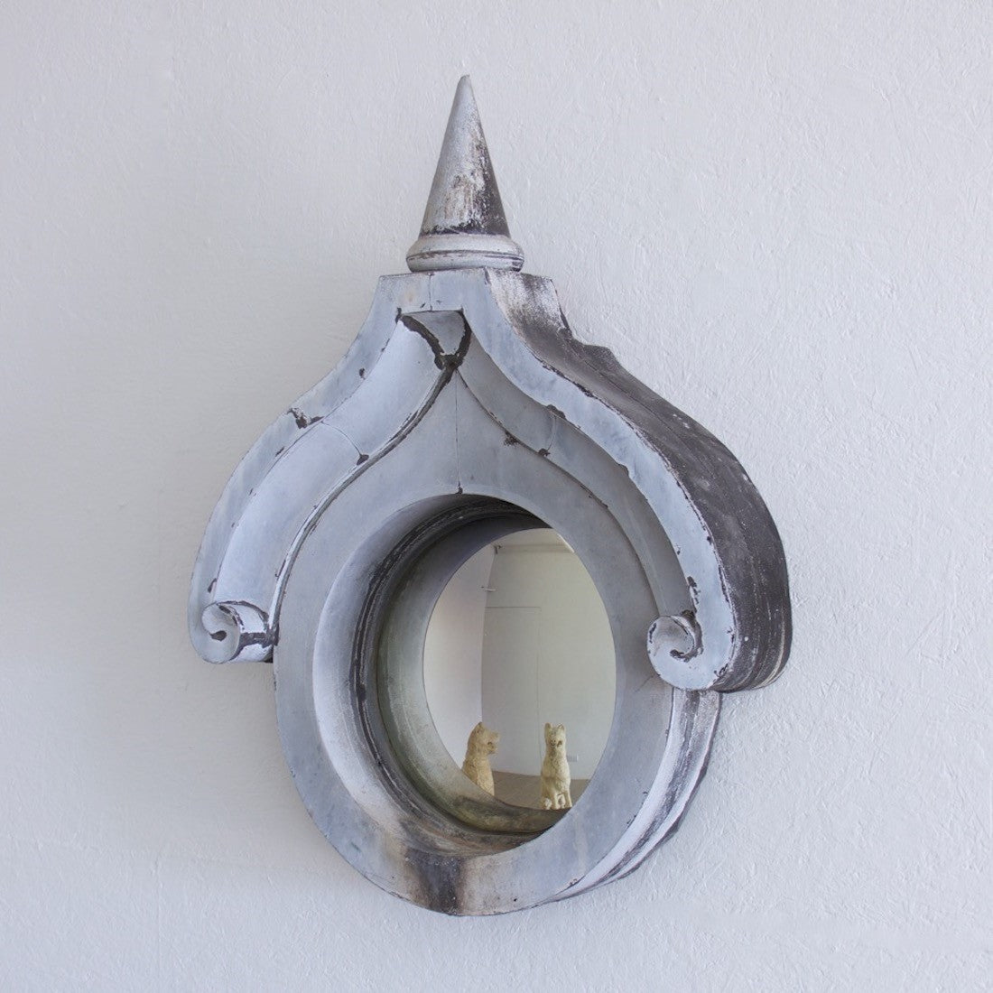 A C19th zinc convex mirror