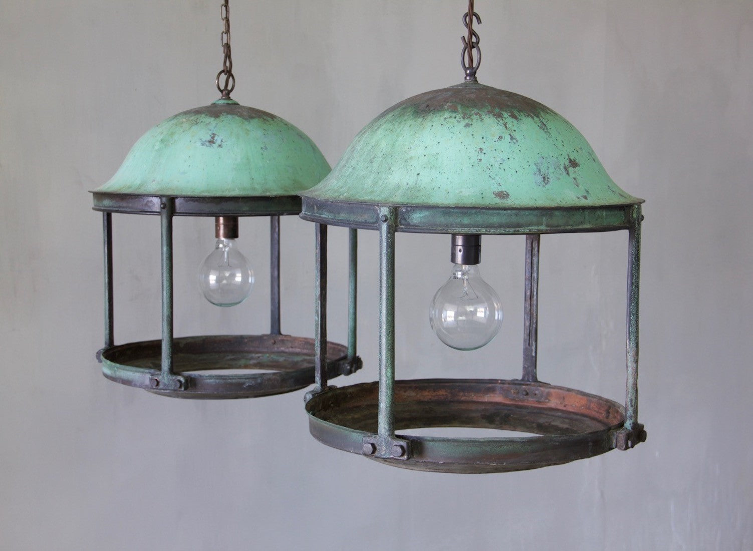 A pair of large copper rotunda lanterns with original verdigris patina