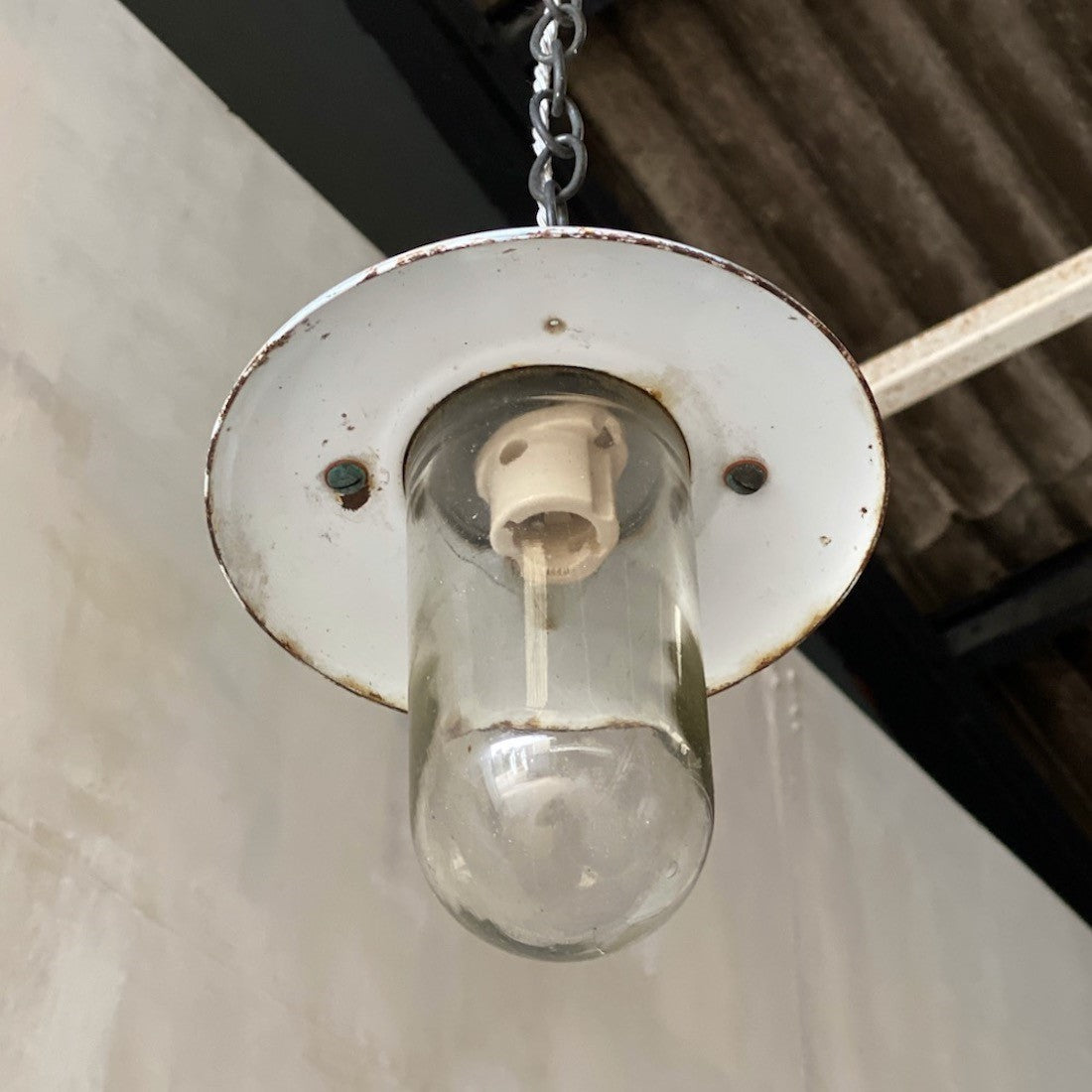 A 1930s iron pendant light