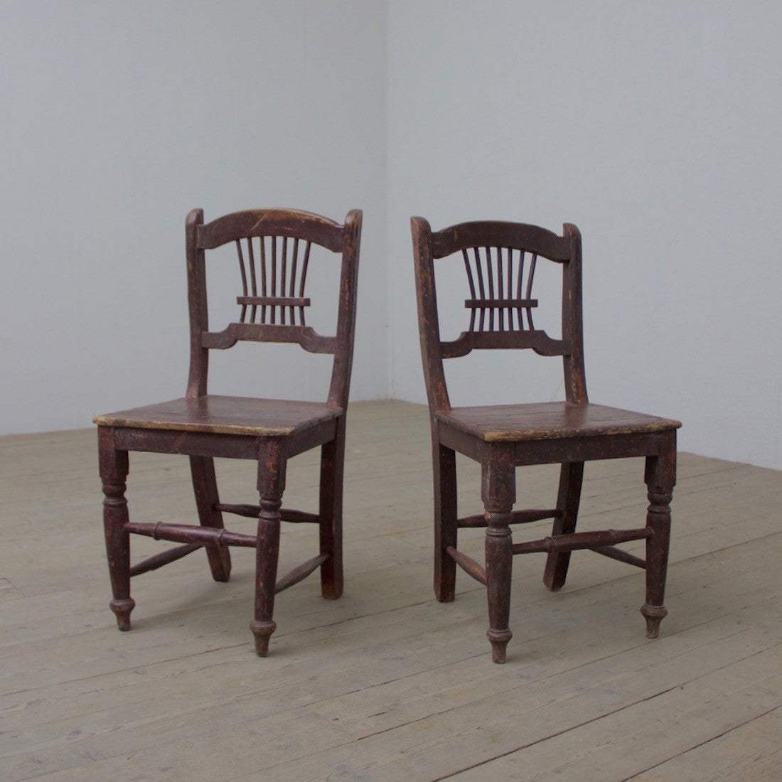 A pair of primitive Irish chairs
