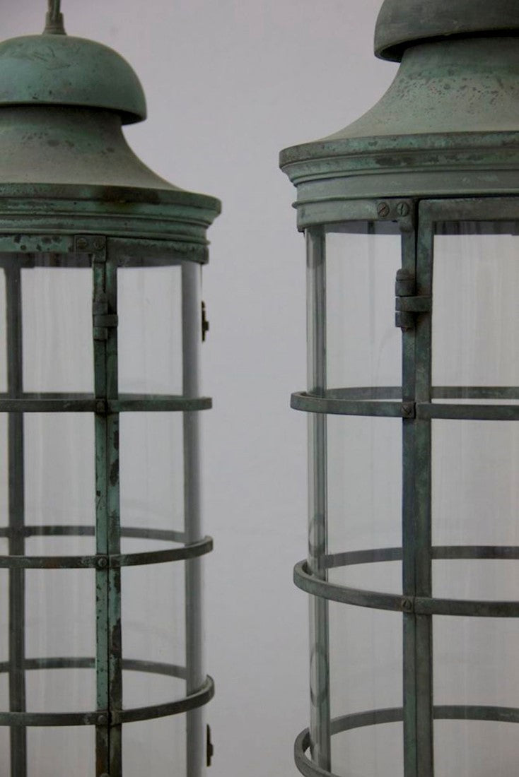 A pair of bronze 1920s lanterns