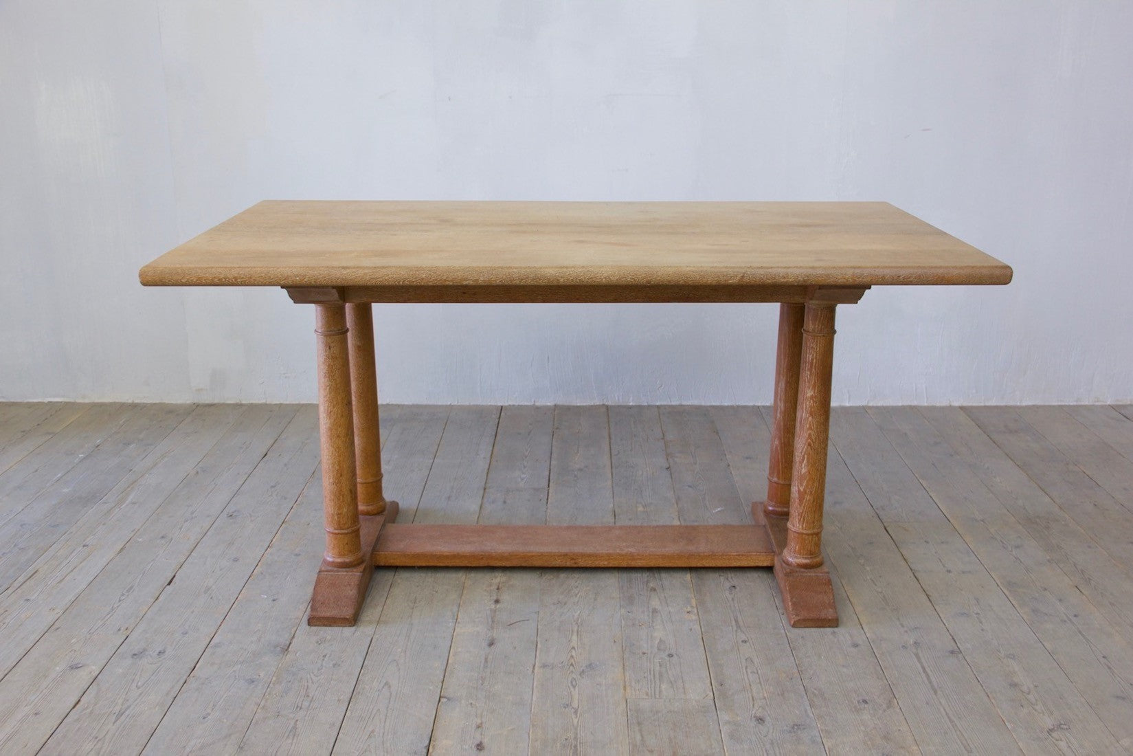 A Heal & Sons oak dining table c.1922