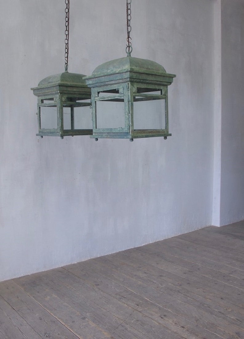 A pair of bronze lanterns
