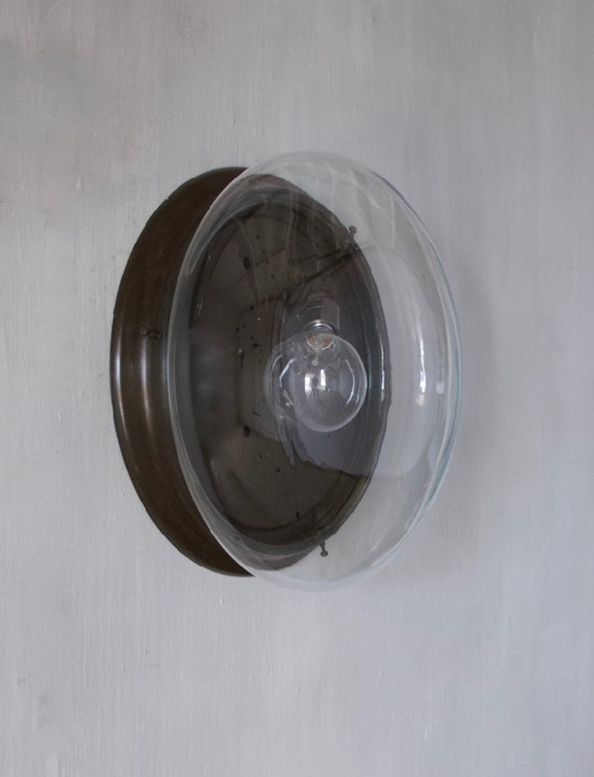 A large pair of glass wall lights