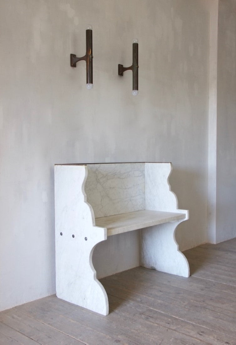 A Carrara marble bench