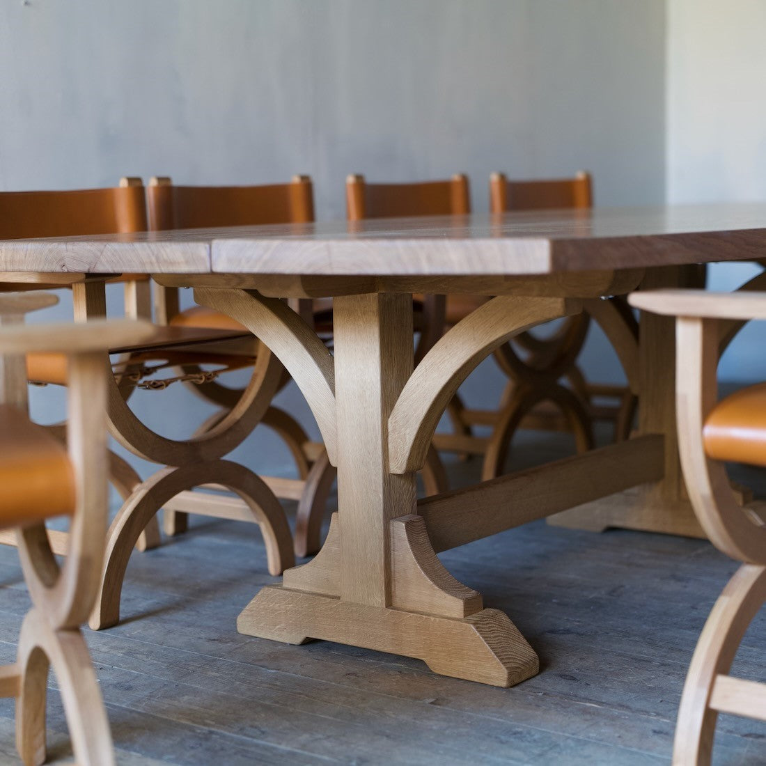 A set of bespoke x-frame chairs