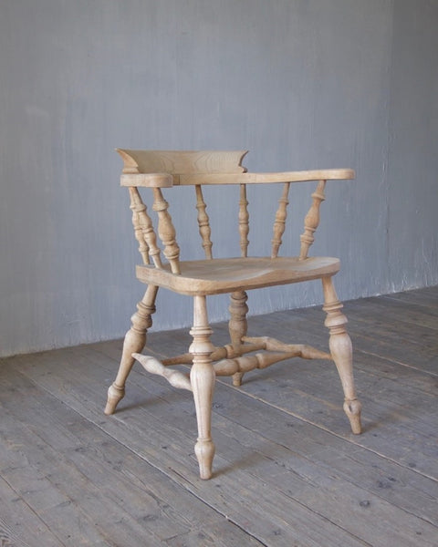 A set of 8 captain's chairs