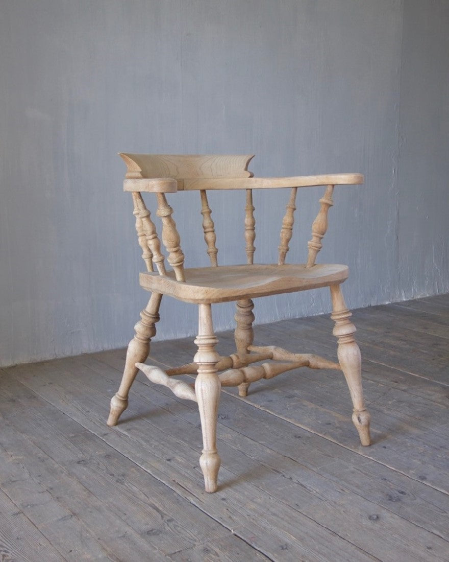 A set of 8 captain's chairs