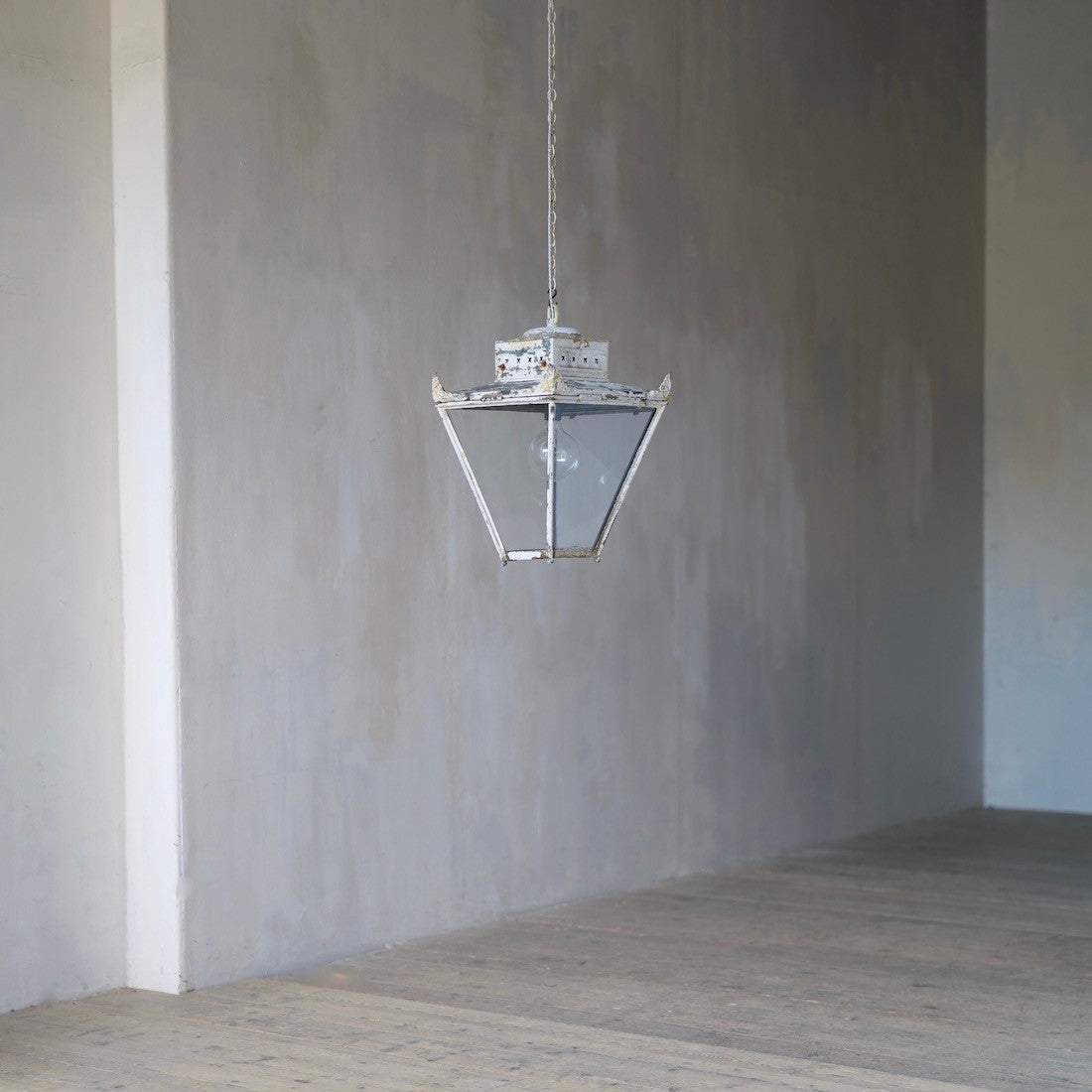 A large 1920s square copper lantern