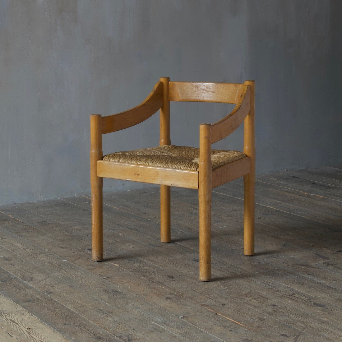 A set of eight Carimate armchairs