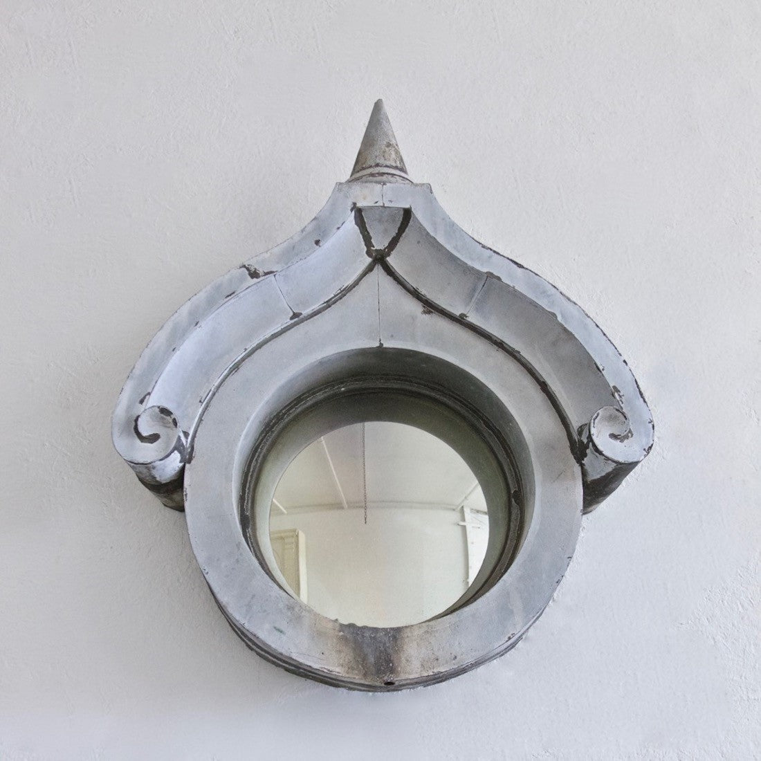 A C19th zinc convex mirror