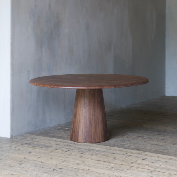 A bespoke pedestal dining table
