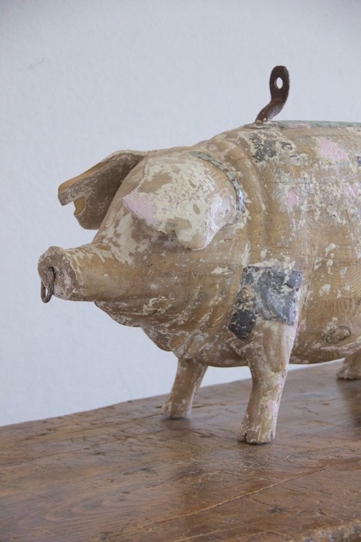 A carved wood butcher's sign