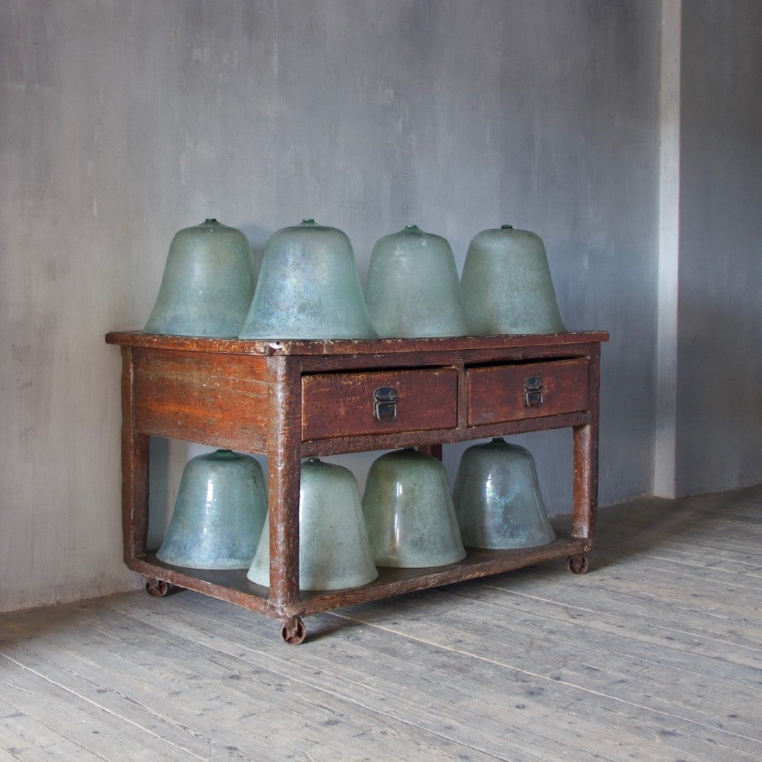 A set of 8 Edwardian glass cloches
