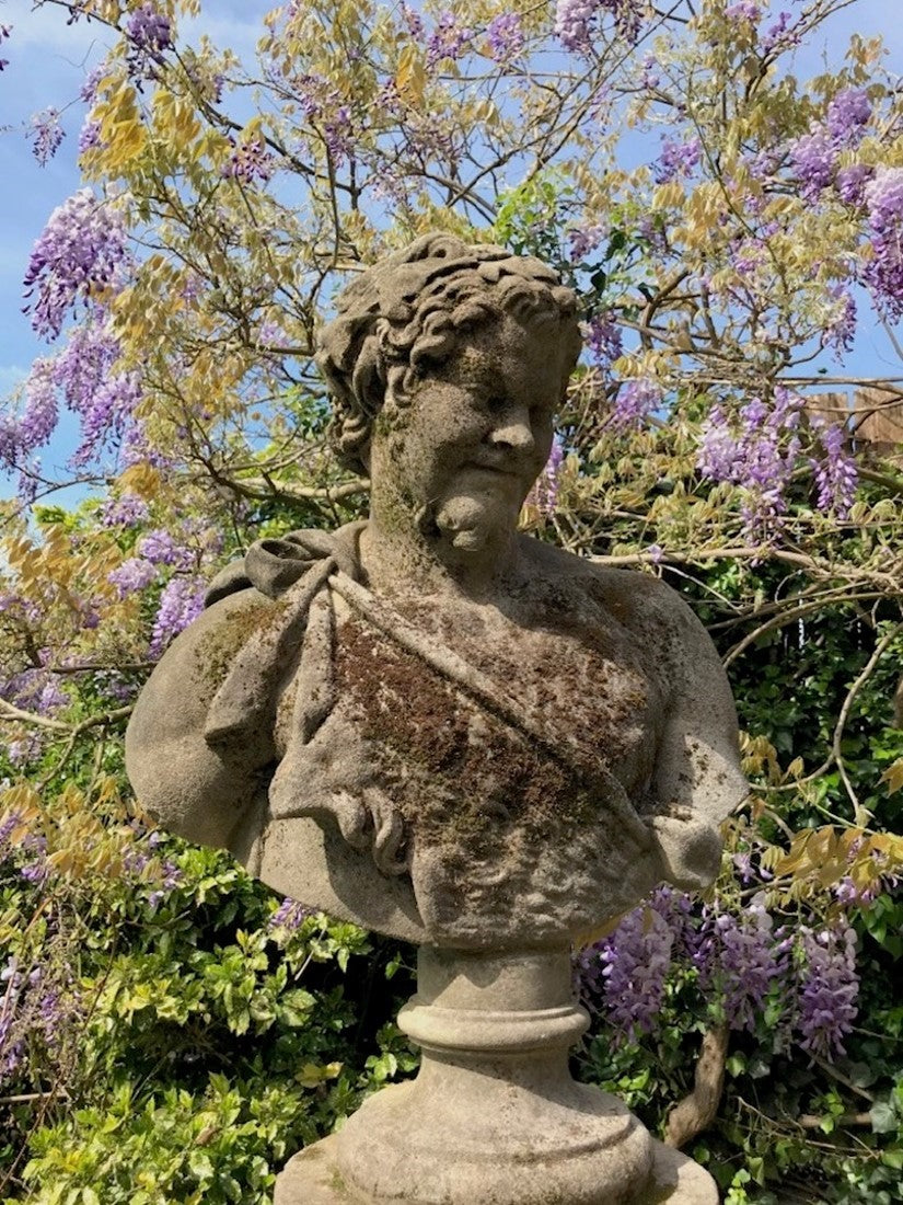 Two classical busts on columns