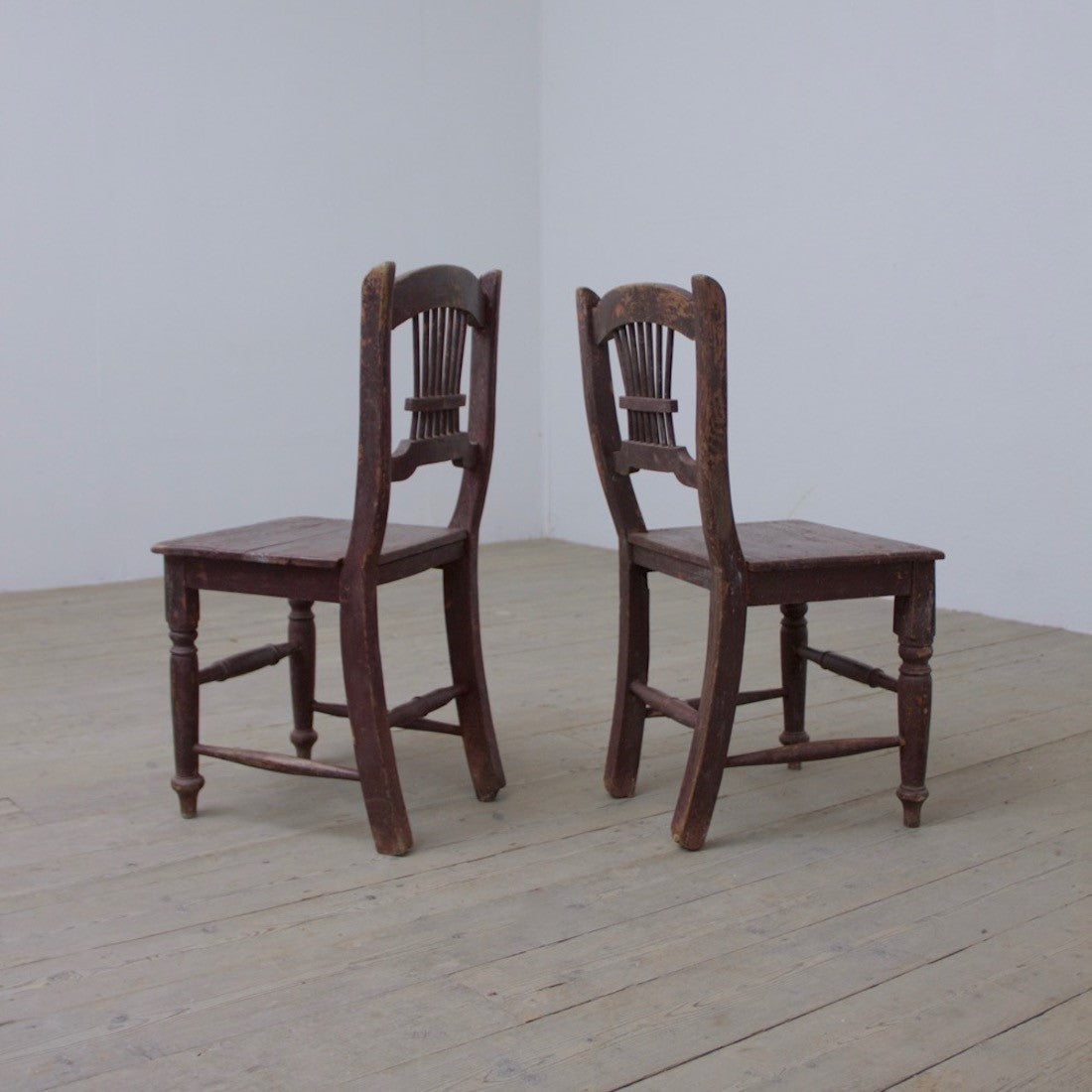 A pair of primitive Irish chairs