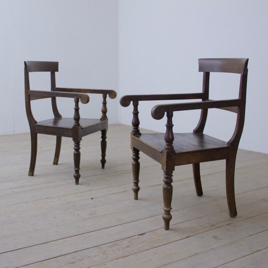 A pair of Georgian 'verandah' chairs
