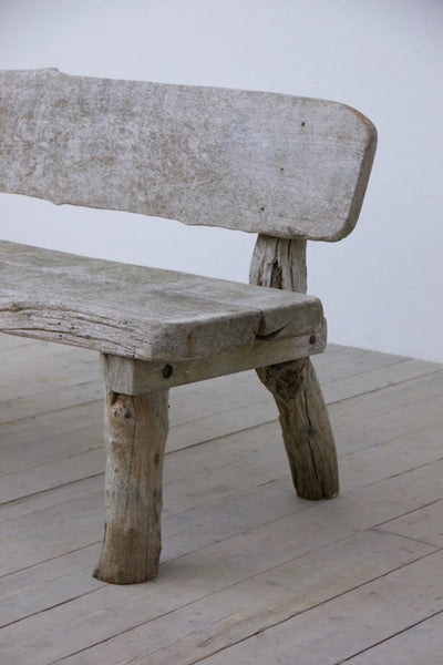 A rustic oak bench