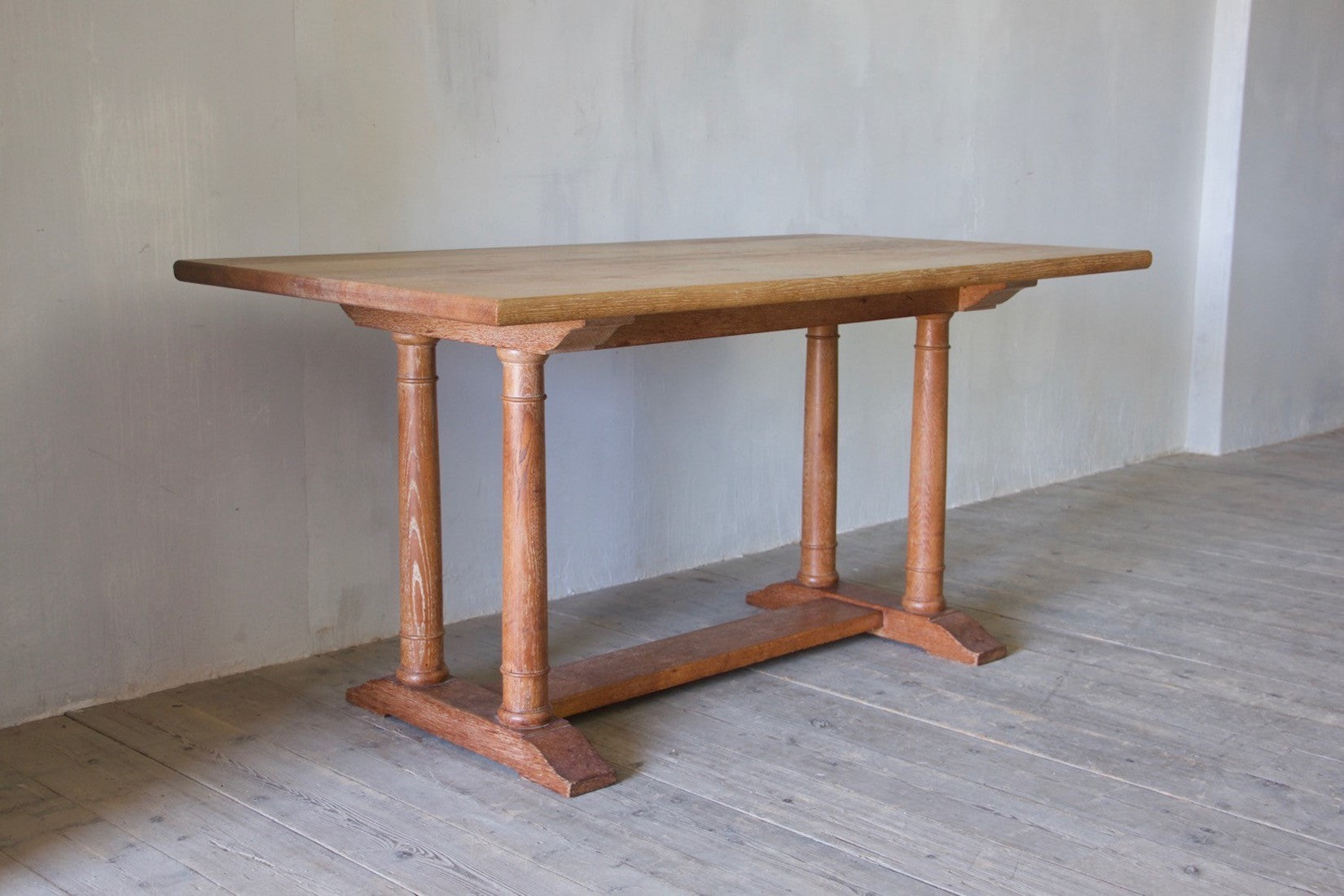 A Heal & Sons oak dining table c.1922