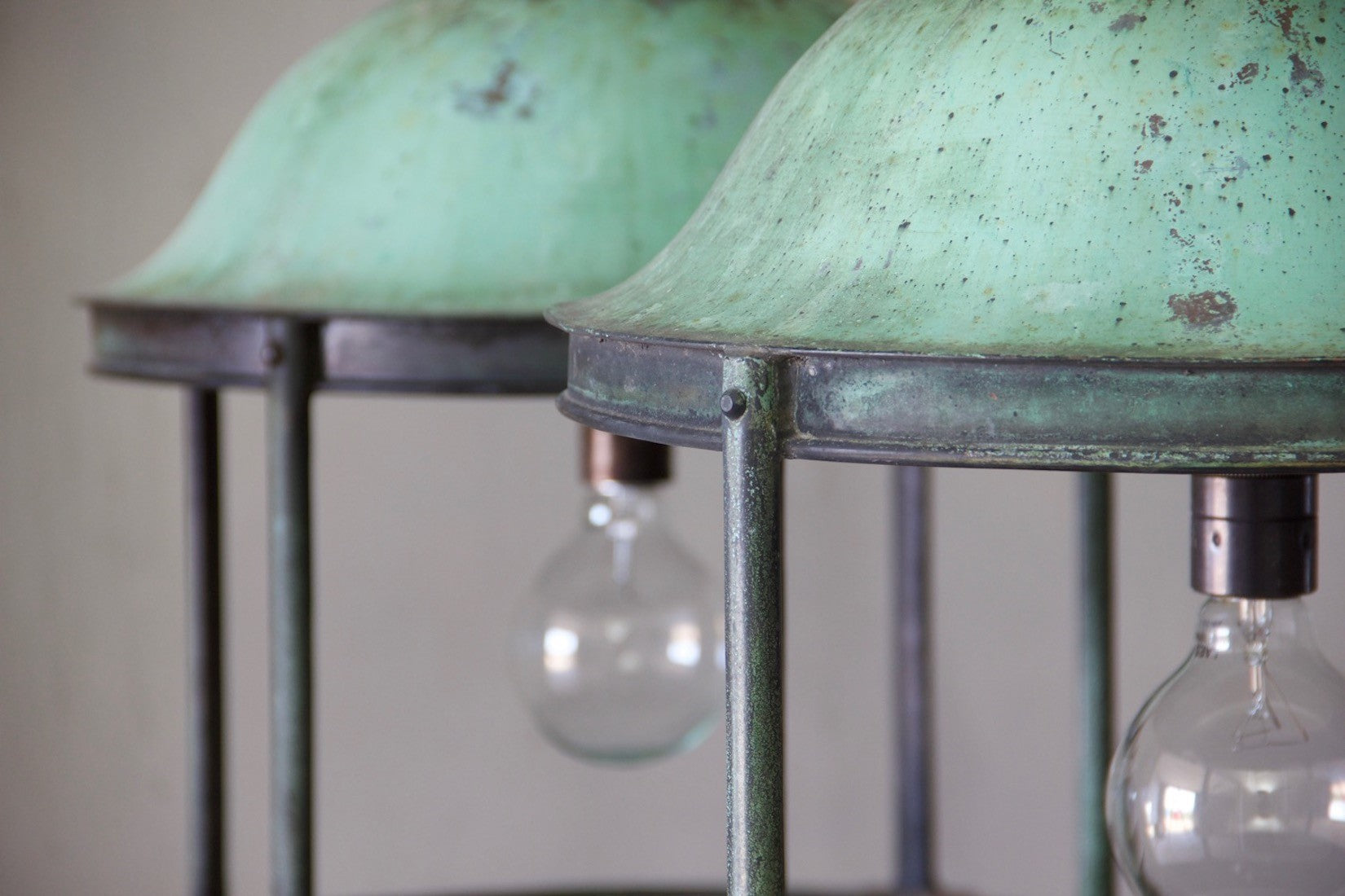 A pair of large copper rotunda lanterns with original verdigris patina