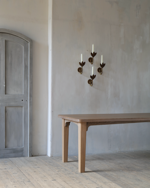 A set of four petal sconces