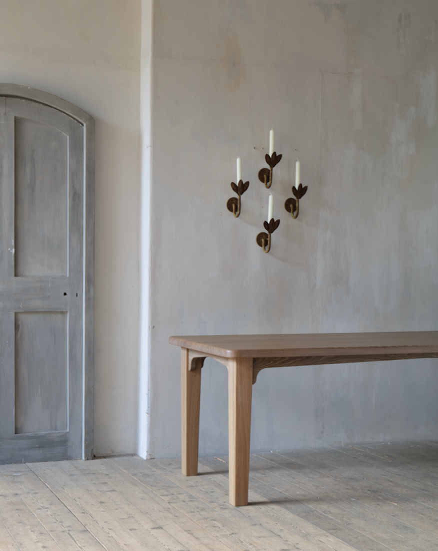 A set of four petal sconces