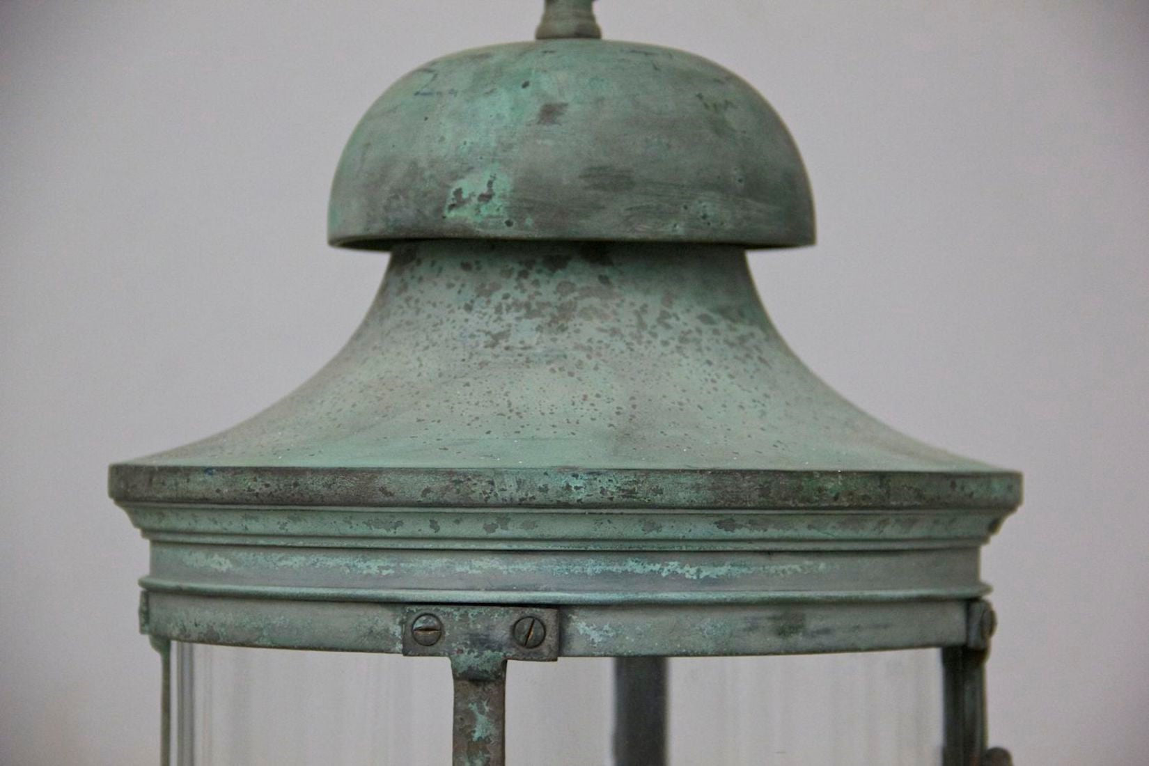 A pair of bronze 1920s lanterns