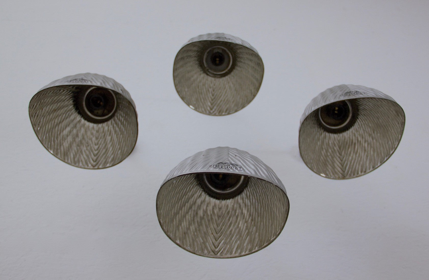 A set of 4 mirrored wall lights