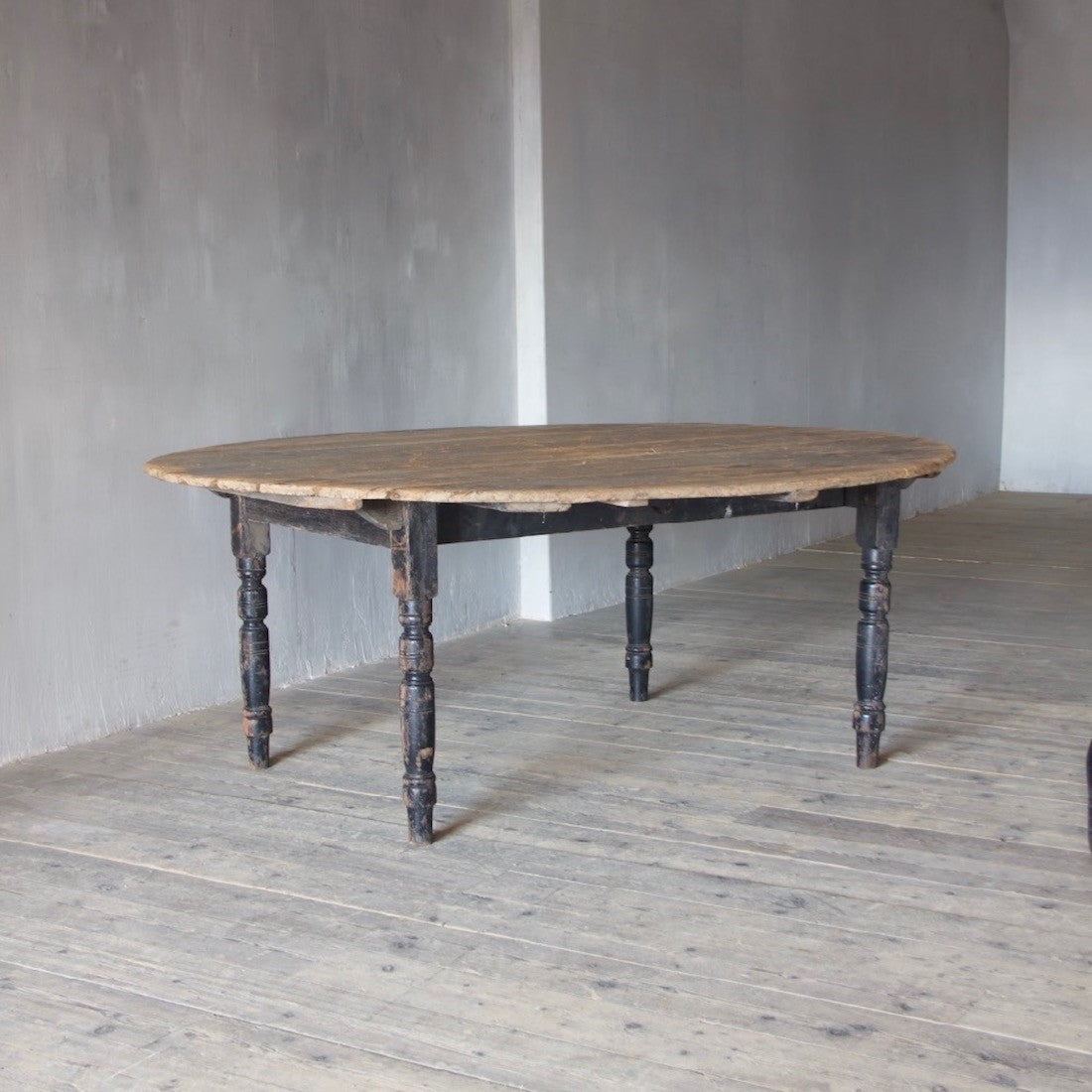 A circular folding J. Lyons & Co. table