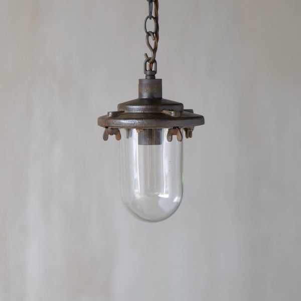 An industrial iron pendant light