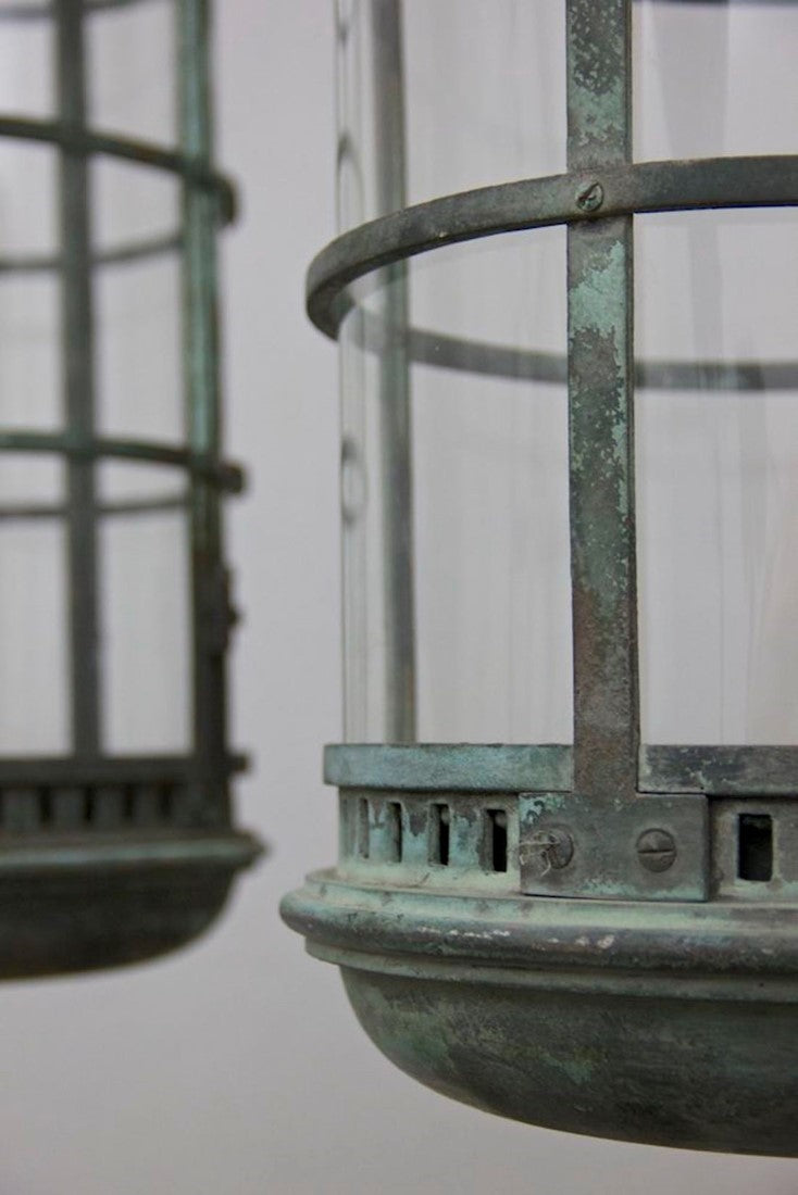 A pair of bronze 1920s lanterns
