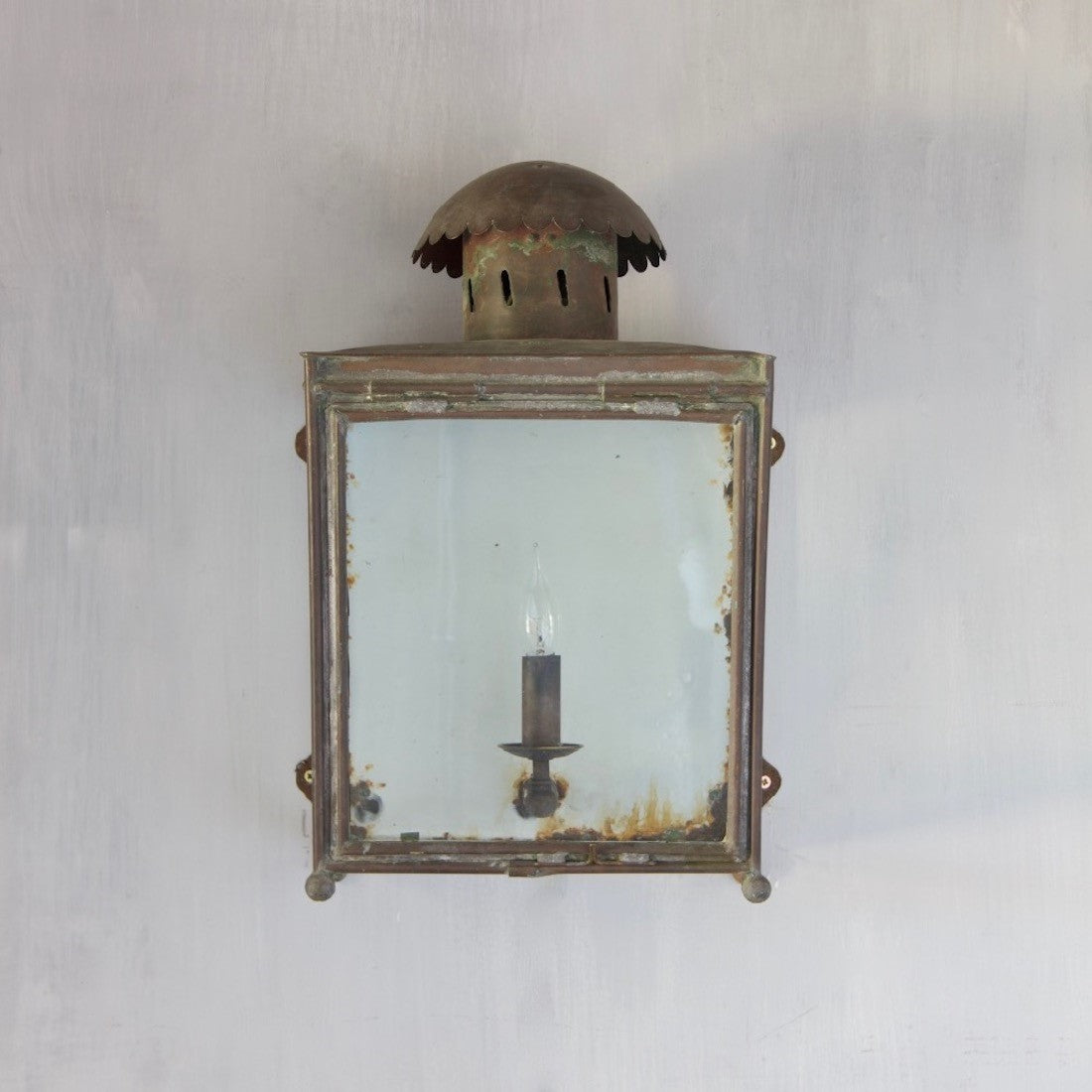 A copper LMS wall lantern