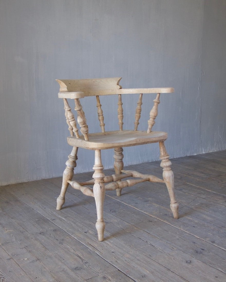 A set of 8 captain's chairs