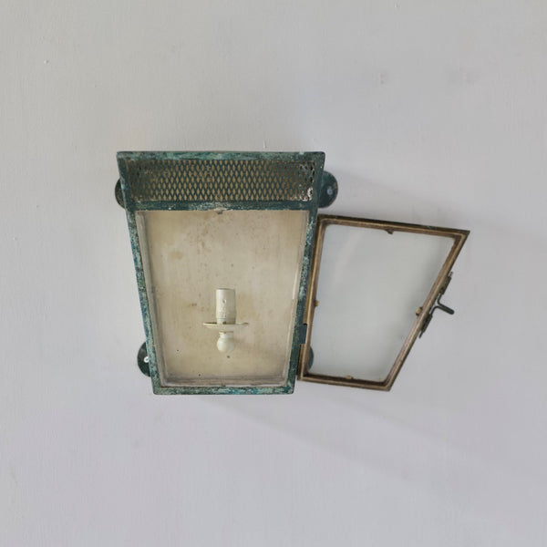 A simple estate-made wall lantern