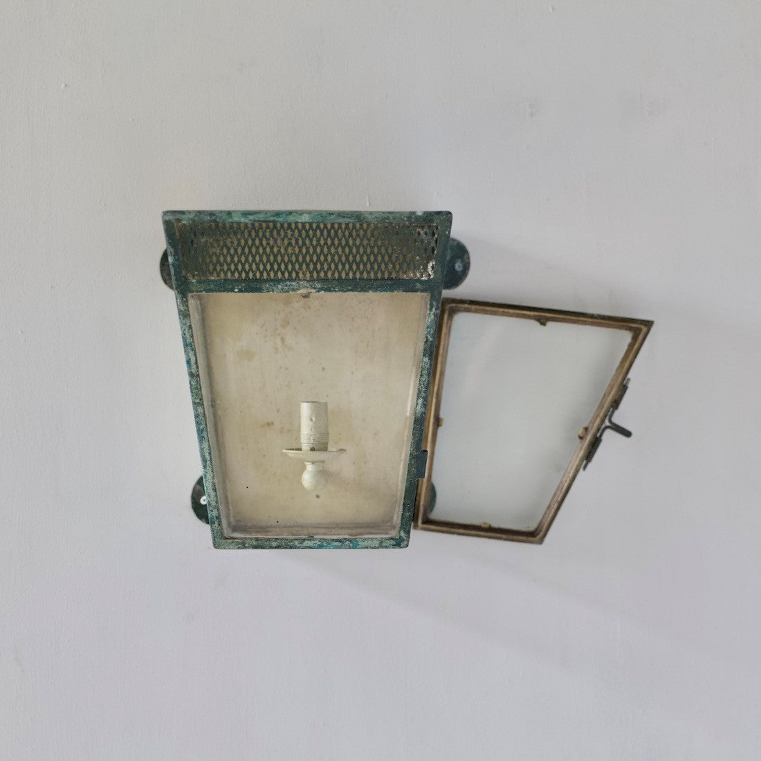 A simple estate-made wall lantern