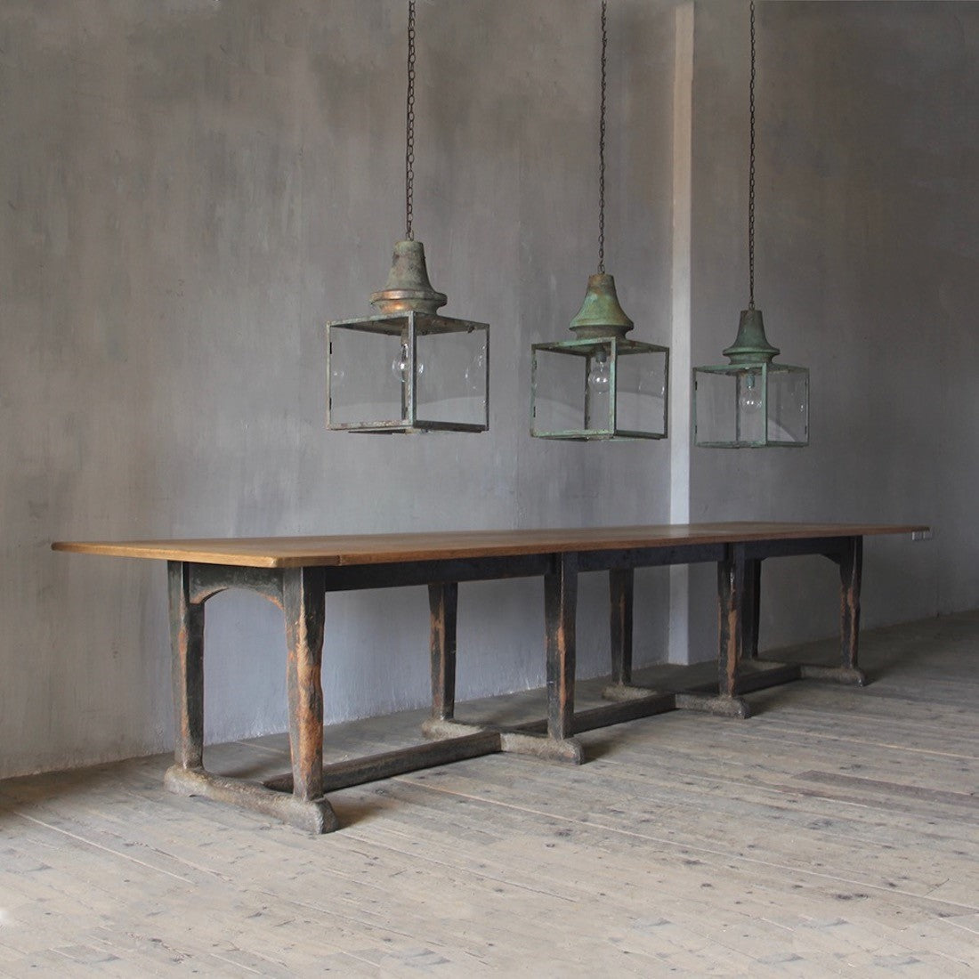 A set of three verdigris copper lanterns