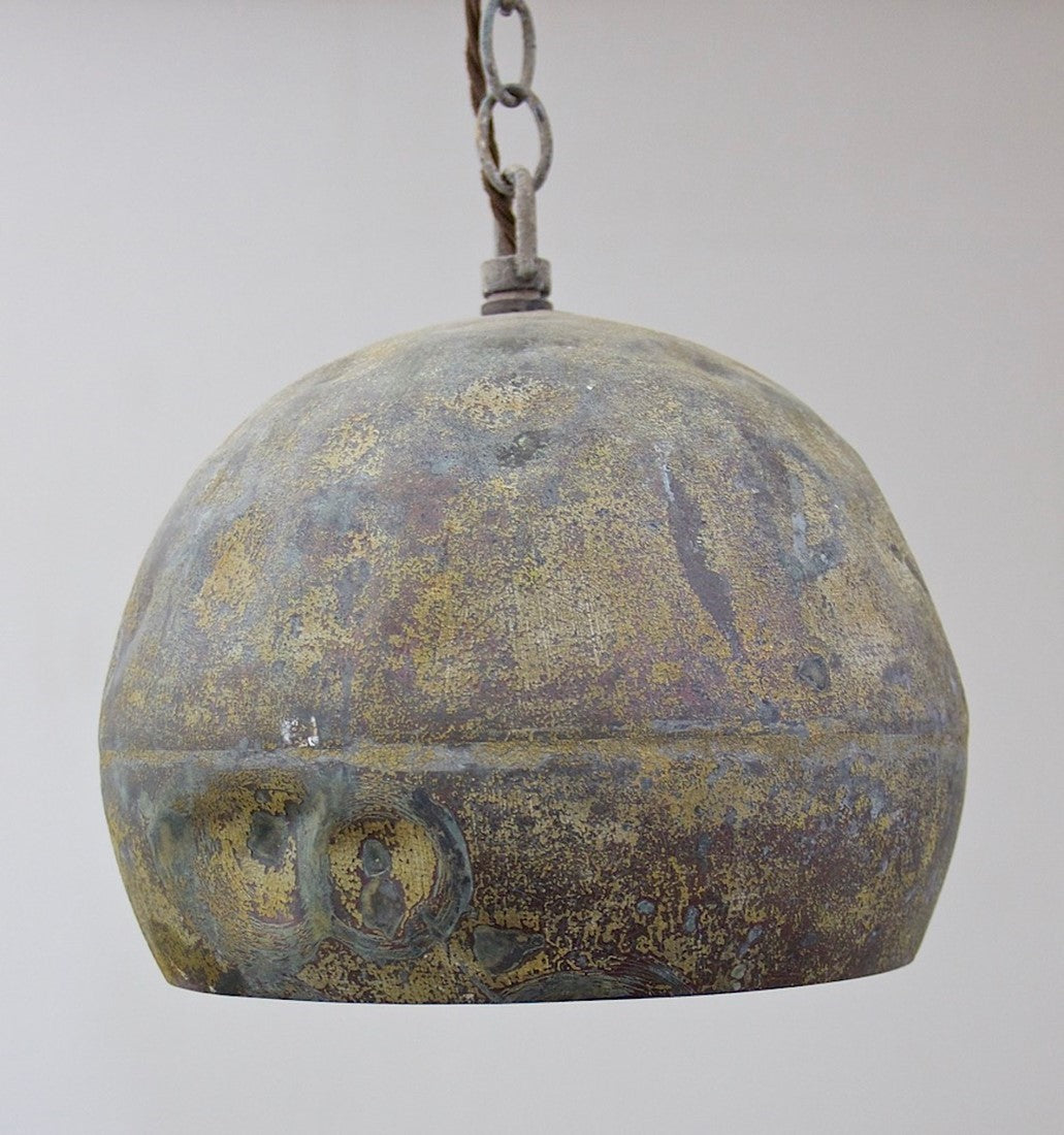 A set of three copper pendant lights