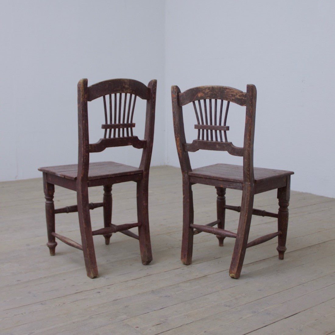 A pair of primitive Irish chairs