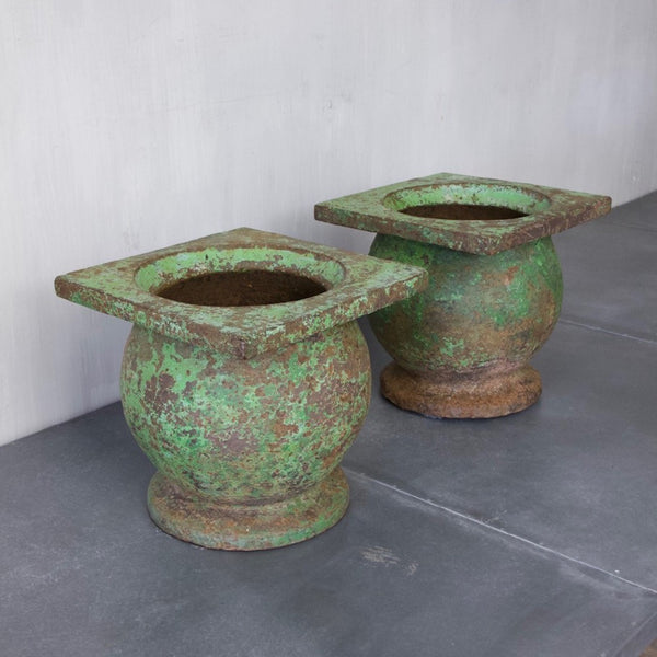 A pair of geometric planters