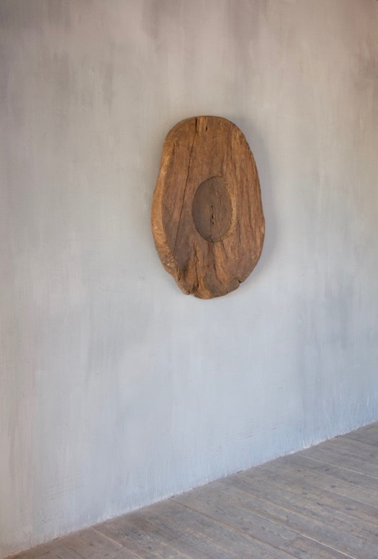 A very large wooden plate