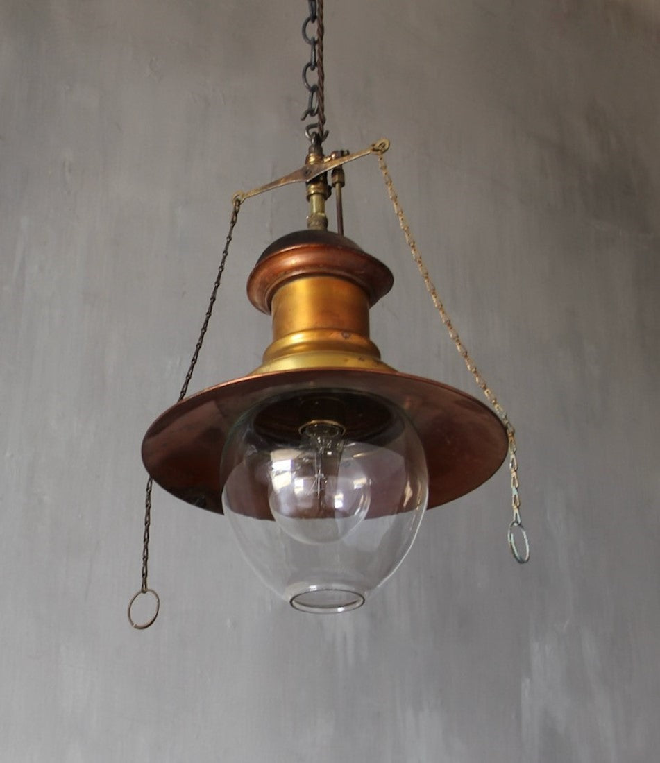 A set of three original gas pendant lights