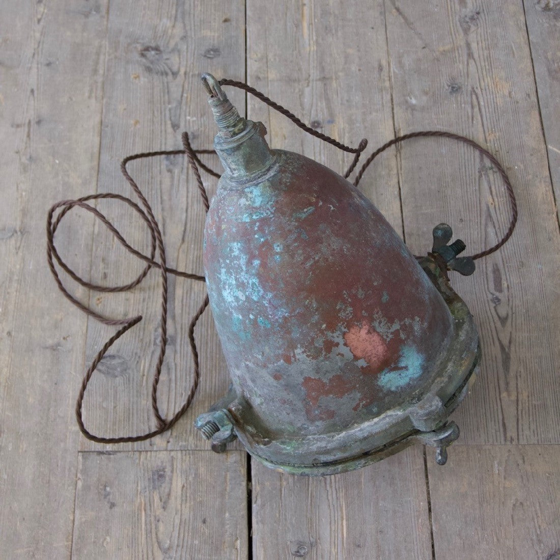 A 1930s copper and brass pendant light