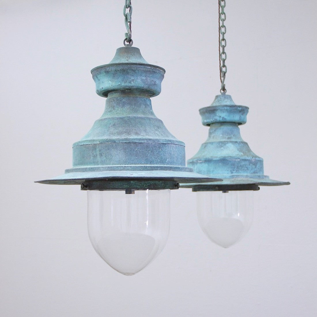 A large pair of copper station lights