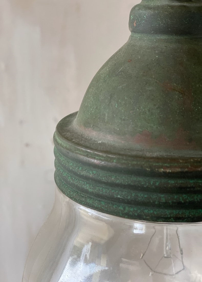 A small copper globe pendant light