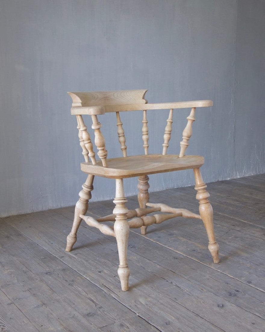 A set of 8 captain's chairs
