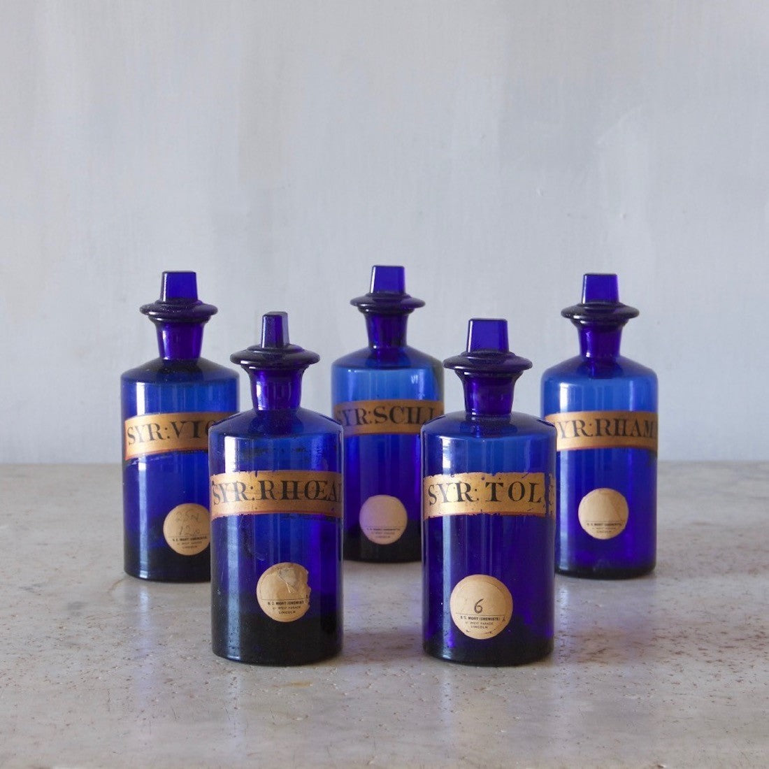 A collection of five C19th apothecary bottles
