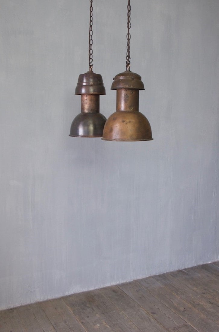 2 similar copper pendant lights